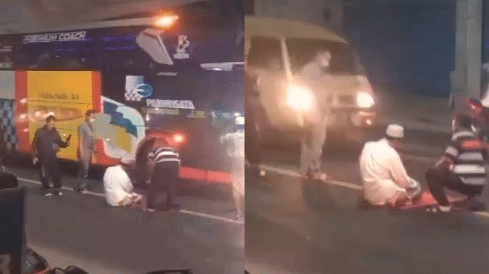 Aneh, Lelaki Ini Khusyuk Tunaikan Solat Di Jalan Raya Sesak